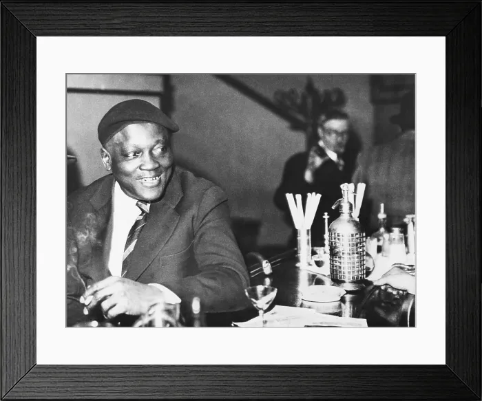 Framed Print : Jack Johnson former heavyweight champion in Paris April 4, 1933. Jack Johnson lived in Paris before World War 1, where he escaped American racism Framed Print : Jack Johnson former heavyweight champion in Paris April 4, 1933. Jack Johnson lived in Paris before World War 1, where he escaped American racism