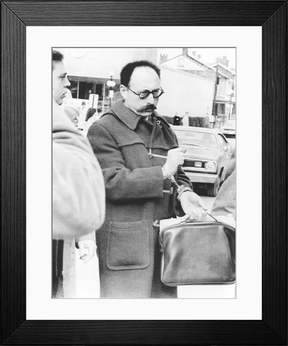Framed Print : Ralph Ginzburg in handcuffs as he is led to the Federal Petitionary in Lewisburg Pennsylvania. Feb. 2, 1972
