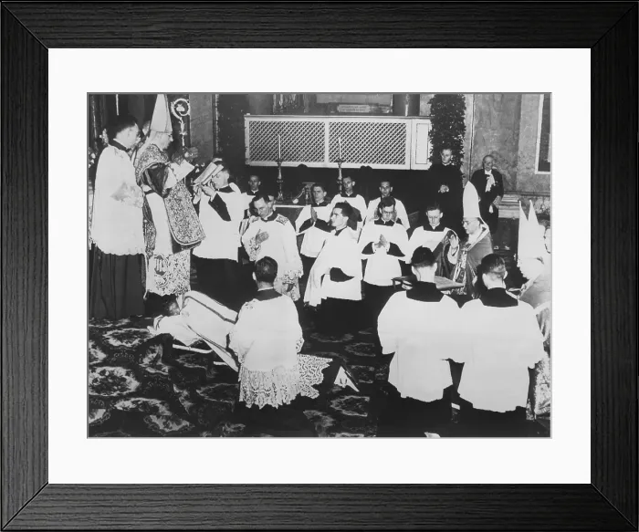 Framed Print : Newly consecrated Bishop Fulton J. Sheen lies prostate on the altar steps, before Cardinal Piazza. June 12, 1951, Church of St. Paul and John, Rome, Italy. (CSU_2015_9_1143)