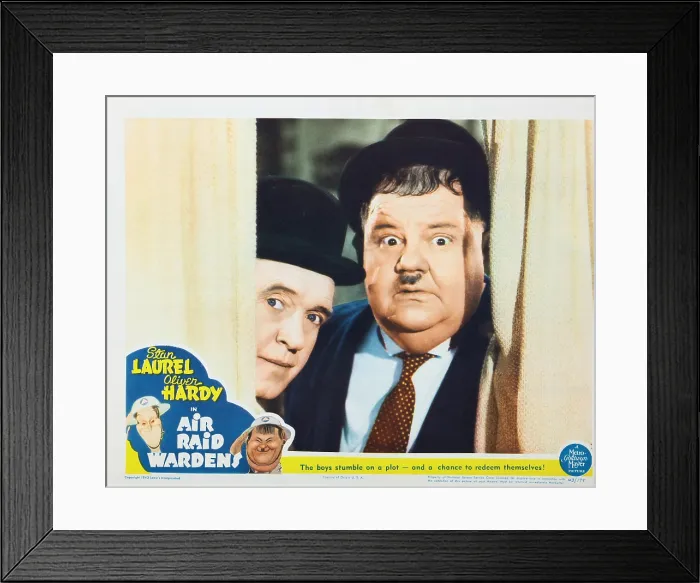 Framed Print : AIR RAID WARDENS, US lobbycard, from left: Stan Laurel, Oliver Hardy, 1943