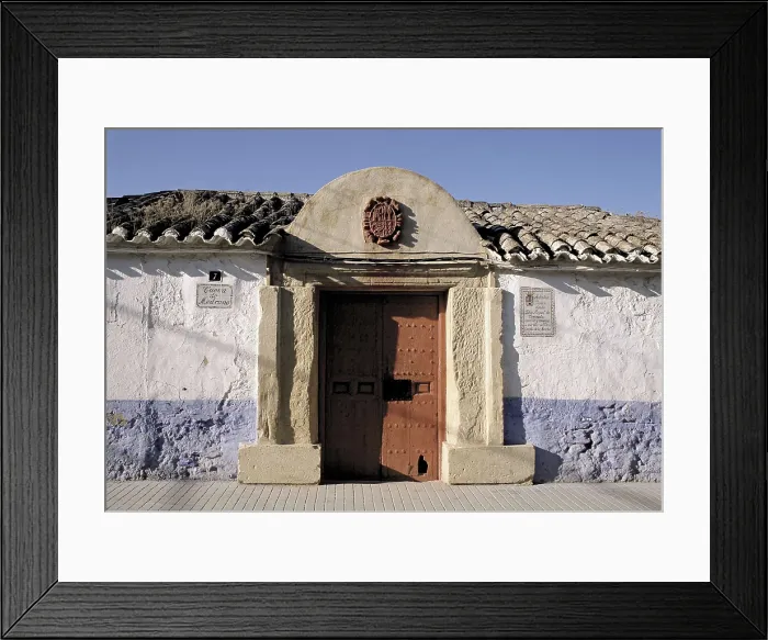 Framed Print : CERVANTES SAAVEDRA, Miguel de (1547-1616). House of Medrano's outside, place where Cervantes was imprisoned and where he started to write Don Quixote. SPAIN