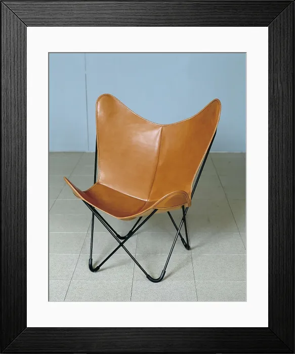 Framed Print : BONET CASTELLANA, Antoni (1913-1989). BKF or Butterfly Chair. 1938-1939. Steel and leather chair. Designed with Juan Kurchan and Jorge Ferrari Hardoy. Furniture. SPAIN. Barcelona