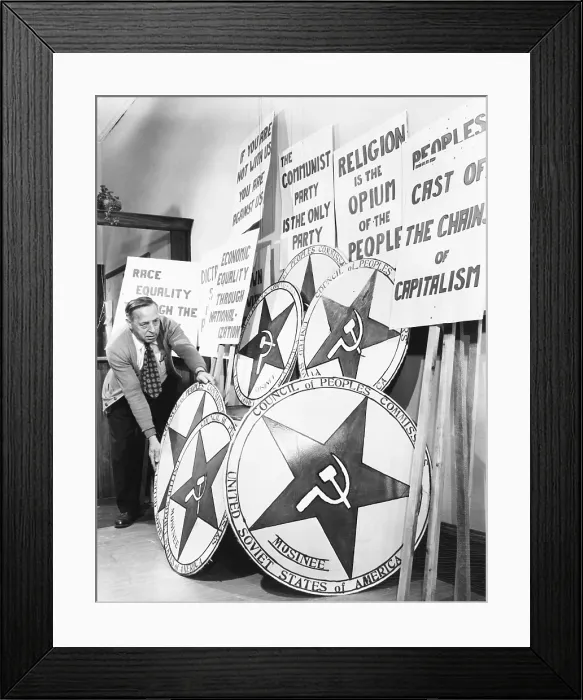 Framed Print : The Mosinee, Wisconsin, American Legion staged a mock Communist takeover. April 29, 1950. A participant organizes some signs and props for the anti-communist show Framed Print : The Mosinee, Wisconsin, American Legion staged a mock Communist takeover. April 29, 1950. A participant organizes some signs and props for the anti-communist show