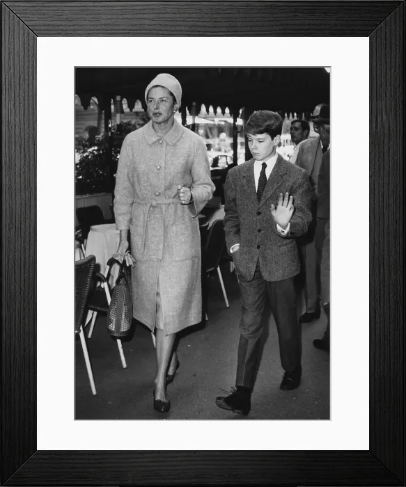 Framed Print : Ingrid Bergman walking with her 13-year-old son Robertino, along the Via Veneto in Rome. April 18, 1963. (CSU_2015_7_332)