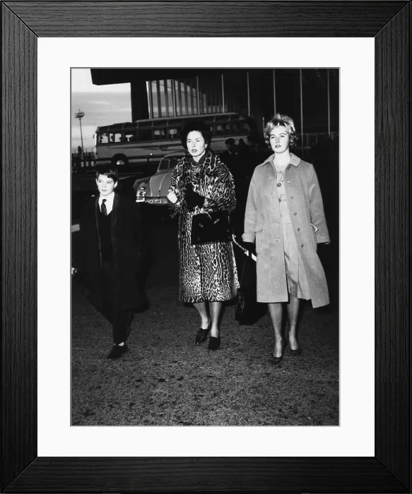 Framed Print : Ingrid Bergman with her children, Pia Lindstrom and Robertino Rossellini, at Rome airport. Jan. 5, 1962 (CSU_2015_7_334) Framed Print : Ingrid Bergman with her children, Pia Lindstrom and Robertino Rossellini, at Rome airport. Jan. 5, 1962 (CSU_2015_7_334)