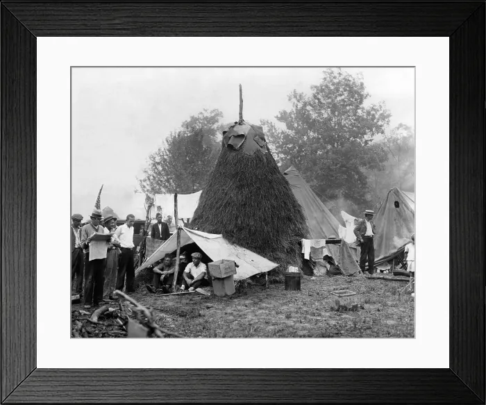Framed Print : St. Louis Bonus Veterans encampment in Johnstown, Pennsylvania. One ingenuous shelter is thatched with hay and has a swanky tent entrance. Aug. 3, 1932