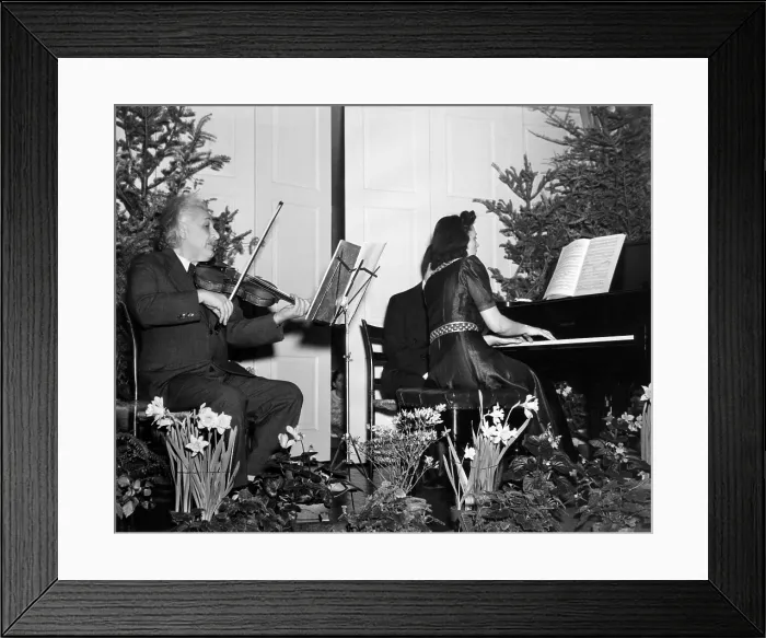 Framed Print : Albert Einstein giving a violin recital at for the benefit of American Friends Service Committee for Refugee Children. At the piano is Gaby Casasesus. Jan. 24, 1941 Framed Print : Albert Einstein giving a violin recital at for the benefit of American Friends Service Committee for Refugee Children. At the piano is Gaby Casasesus. Jan. 24, 1941