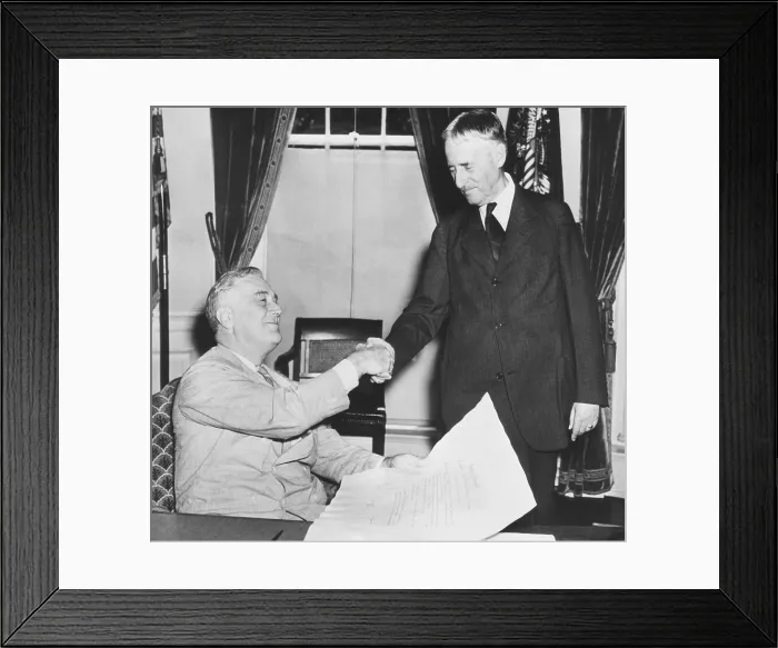 Framed Print : President Franklin Roosevelt shaking hands with his new Secretary of War, Republican Henry Stimson. July 10, 1940