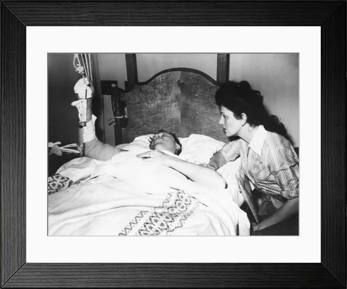 Framed Print : Labor Leader Walter Reuther in hospital after an attempted assassination. His wife, May Reuther, was at his hospital bedside. April 21, 1948 Framed Print : Labor Leader Walter Reuther in hospital after an attempted assassination. His wife, May Reuther, was at his hospital bedside. April 21, 1948