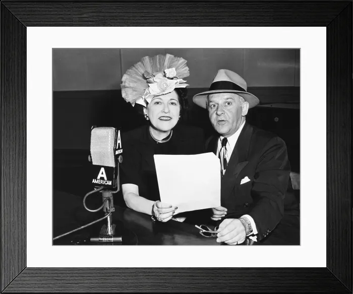 Framed Print : Louella Parsons and Walter Winchell, syndicated gossip columnists in print and on radio. Their NBC radio shows are scheduled on Sunday nights in August 1945