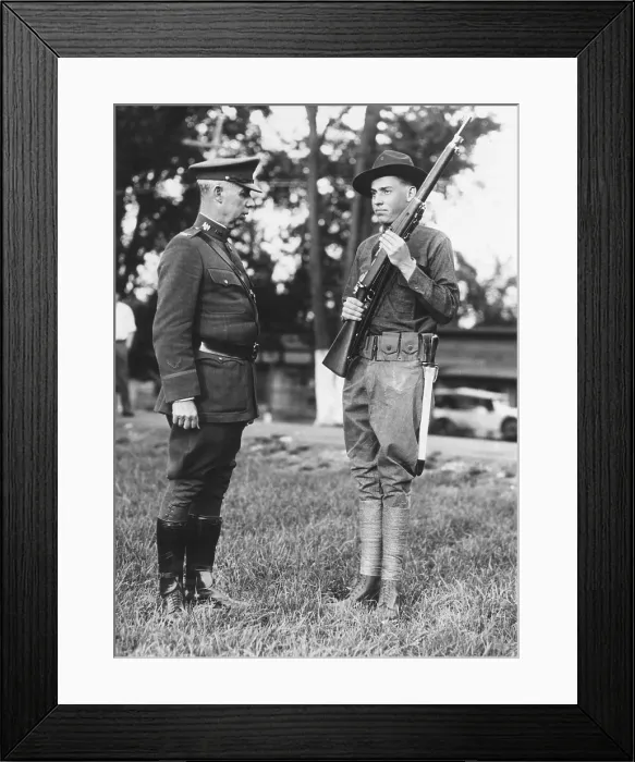 Framed Print : John Coolidge, son of Pres. Coolidge, presenting arms to General Malvern Hill Burnum. He was at the Citizens Military Training Camp, Camp Devens, Ayer, Massachusetts. Sept