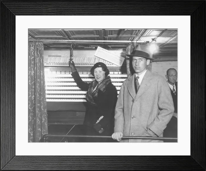 Framed Print : John Coolidge and his wife Florence Trumbull Coolidge voted in New Haven, CT. Nov. 8, 1932. Florence's father, a conservative Republican, was running for Governor