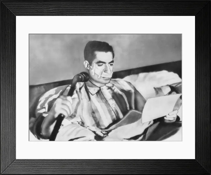 Framed Print : Shah of Iran after an assassination attempt on Feb. 4, 1949. Fakhr-Arai fired five shots from ten feet away but only grazed his check with one bullet