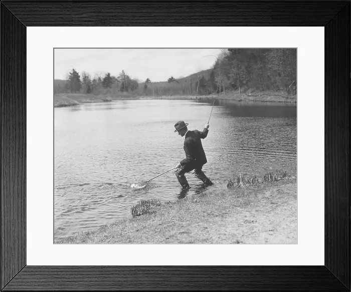 Framed Print : President Calvin Coolidge fishing with a rod and net in a pond. Unknown location. Ca. 1925-28. (CSU_2015_9_781) Framed Print : President Calvin Coolidge fishing with a rod and net in a pond. Unknown location. Ca. 1925-28. (CSU_2015_9_781)