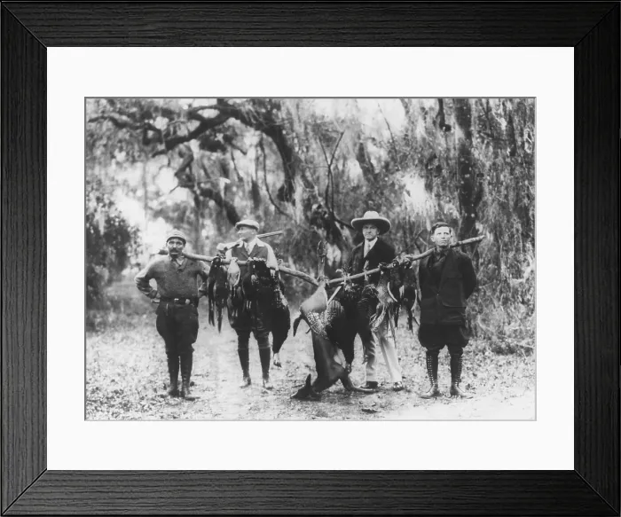 Framed Print : Former President Calvin Coolidge and fellow hunters display their trophies, April 1929. Coolidge was on a vacation hunting trip in the wilds of Sepelo Island, Georgia Framed Print : Former President Calvin Coolidge and fellow hunters display their trophies, April 1929. Coolidge was on a vacation hunting trip in the wilds of Sepelo Island, Georgia