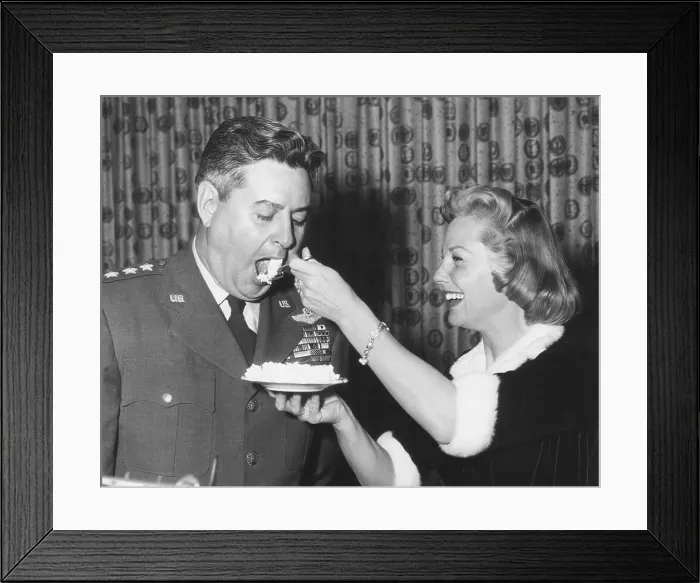 Framed Print : June Allyson serving cake to General Curtis LeMay on the 9th anniversary of SAC