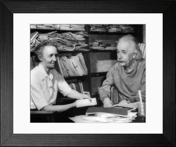Framed Print : Madame Joliot-Curie visits of Albert Einstein. The two Nobel Prize winning physicists talk in the study of Einstein's home in Princeton. March 18, 1948