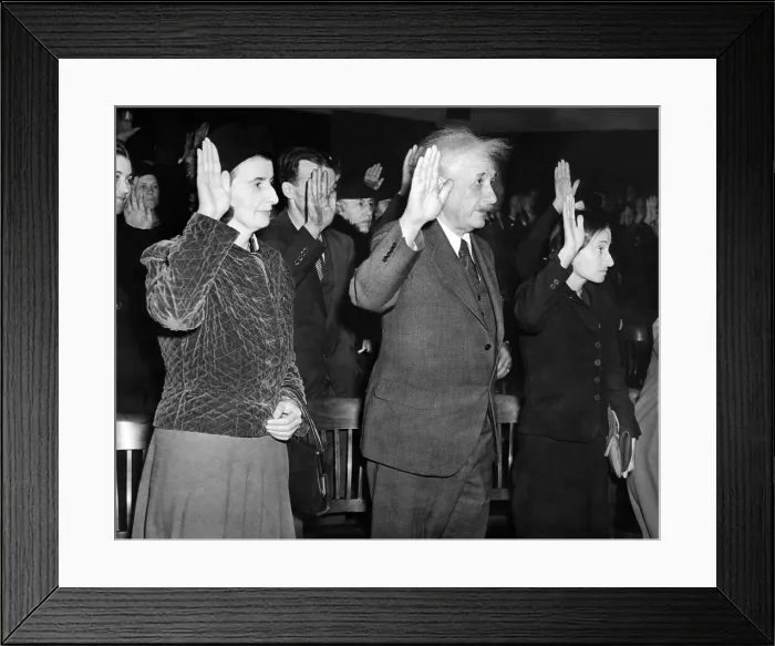 Framed Print : Albert Einstein taking his oath of citizenship. Also taking swearing allegiance in are Helen Dukas, and Einstein's daughter, Margot. Oct. 1, 1940 Framed Print : Albert Einstein taking his oath of citizenship. Also taking swearing allegiance in are Helen Dukas, and Einstein's daughter, Margot. Oct. 1, 1940
