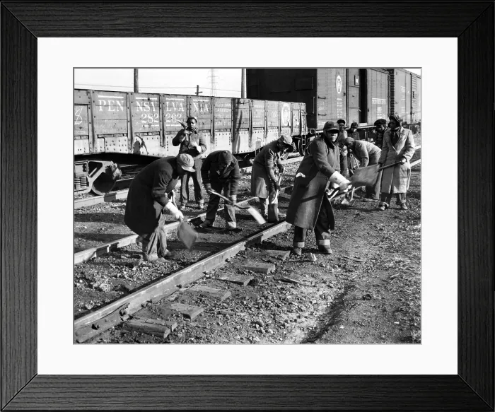 Framed Print : African American women working on a railroad crew. They perform track maintenance in near-zero weather in Chicago Framed Print : African American women working on a railroad crew. They perform track maintenance in near-zero weather in Chicago