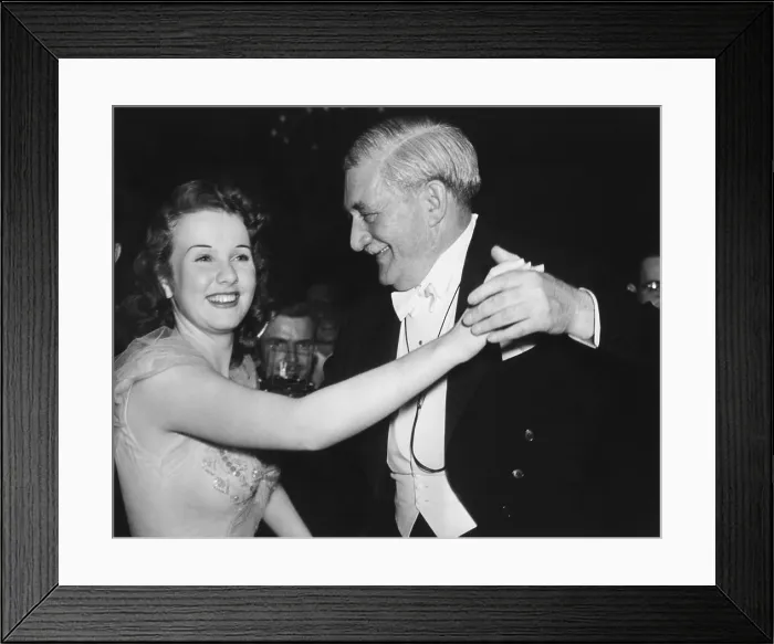 Framed Print : Deanna Durbin, film singing star, and William Knudson dance after the President's Birthday Ball. On Jan