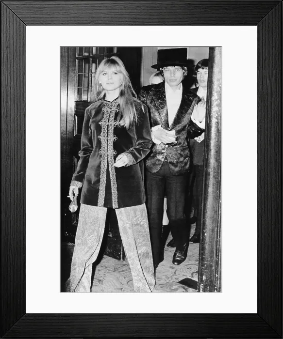 Framed Print : Singer Mick Jagger, and his girlfriend Marianne Faithfull arrive at the Royal Opera House