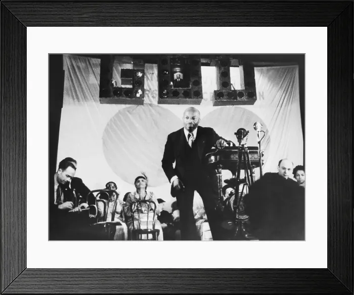 Framed Print : Father Divine speaks to thousands at one of his meetings, ca. 1936. Above him is a sign, GOD. He founded the Peace Mission Movement in 1919 and claimed to be God
