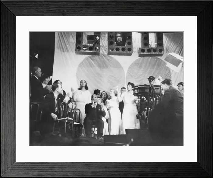 Framed Print : Father Divine leading the singing at one of his meetings