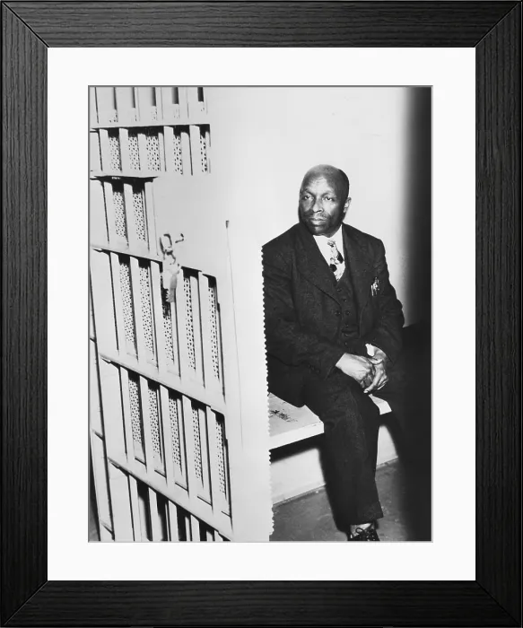 Framed Print : Father Divine sitting in a jail cell, April 21, 1937 Framed Print : Father Divine sitting in a jail cell, April 21, 1937
