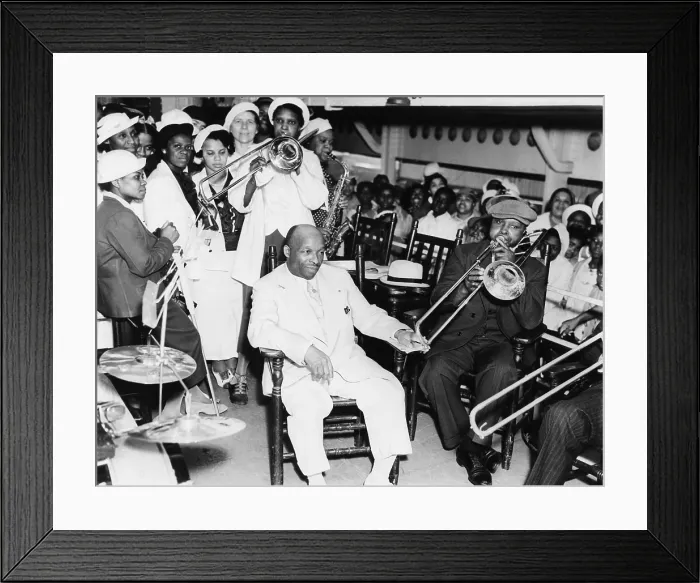 Framed Print : Father Divine is serenaded by followers on the steamer, Aug. 8, 1937. He is bound for his cult's Promised Land Olympic Games, in Kingston, N.Y
