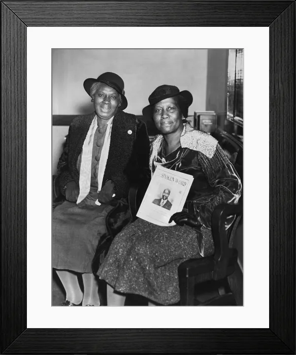 Framed Print : Sister Grace with a copy of The Spoken Word, the magazine of the Peace Mission Movement. April 28, 1937