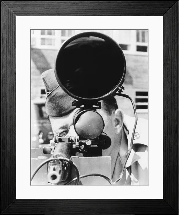 Framed Print : New Jersey National Guardsman demonstrates the use of an M1 rifle with an infrared scope site