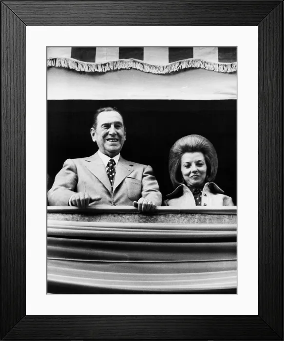 Framed Print : Juan Peron, 77, watches a parade with his wife, Isabel, 40, in Buenos Aires, Aug. 31, 1973 Framed Print : Juan Peron, 77, watches a parade with his wife, Isabel, 40, in Buenos Aires, Aug. 31, 1973