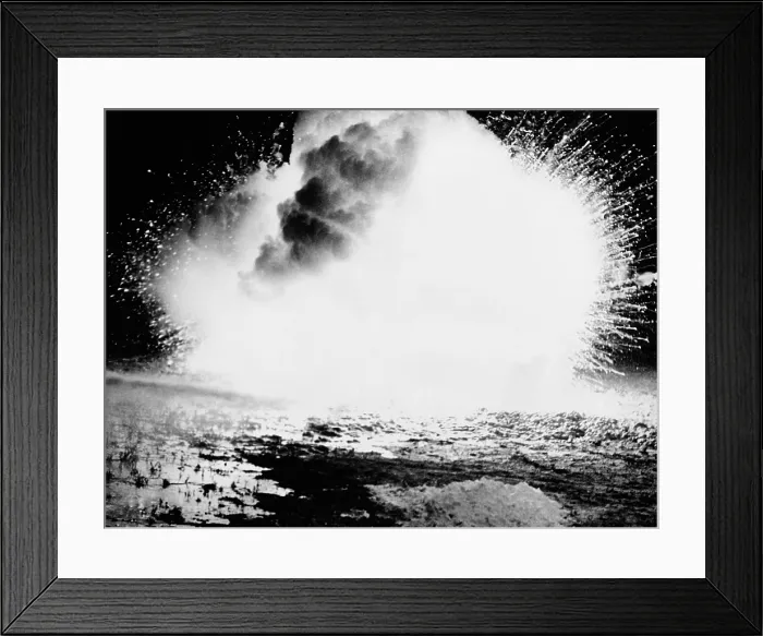 Framed Print : Incendiary bomb. White hot magnesium up to 2700 degrees Fahrenheit is released from a new weapon being dropped on London by German bombers. May 4, 1941