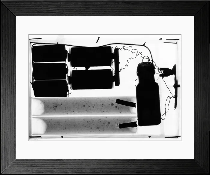 Framed Print : X-ray of bomb. An innocent appearing square package, which did not tick or rattle, was passed under a fluoroscope