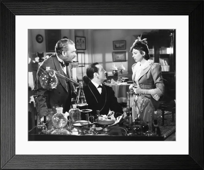 Framed Print : THE ADVENTURES OF SHERLOCK HOLMES, from left: Nigel Bruce as Dr. Watson, Basil Rathbone as Sherlock Holmes, Ida Lupino, 1939. TM & copyright 20th Century Fox Film Corp Framed Print : THE ADVENTURES OF SHERLOCK HOLMES, from left: Nigel Bruce as Dr. Watson, Basil Rathbone as Sherlock Holmes, Ida Lupino, 1939. TM & copyright 20th Century Fox Film Corp