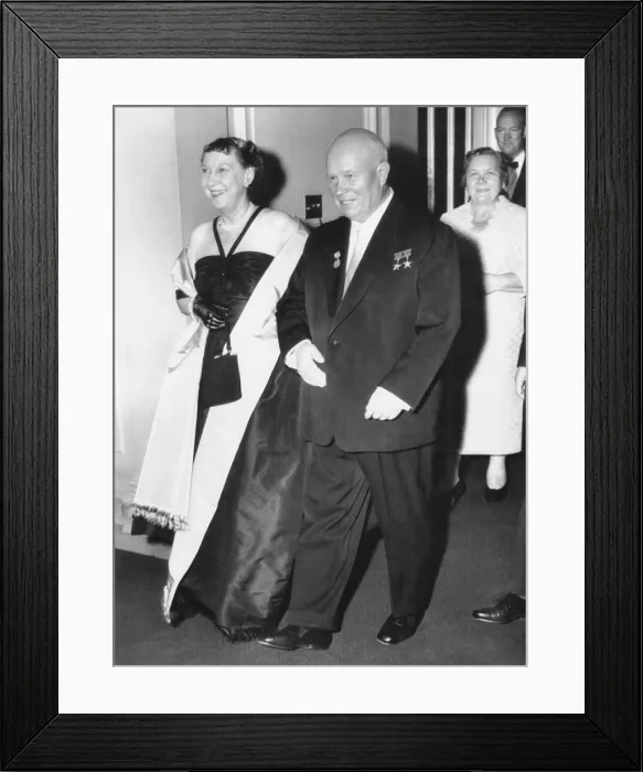Framed Print : Soviet Premier Nikita Khrushchev escorts Mamie Eisenhower into dinner at the Soviet embassy. Washington, D.C. Sept. 16, 1959. In the background are Nina Khrushchev and Maj