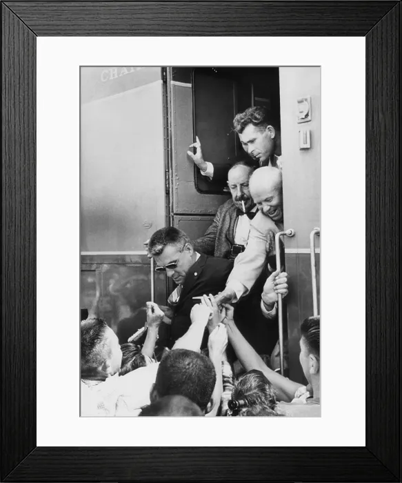 Framed Print : Premier Nikita Khrushchev reaches out for one last handshake from his train. The Soviet Russian leader was leaving San Luis Obispo, California, during his tour of the U.S. Sept Framed Print : Premier Nikita Khrushchev reaches out for one last handshake from his train. The Soviet Russian leader was leaving San Luis Obispo, California, during his tour of the U.S. Sept