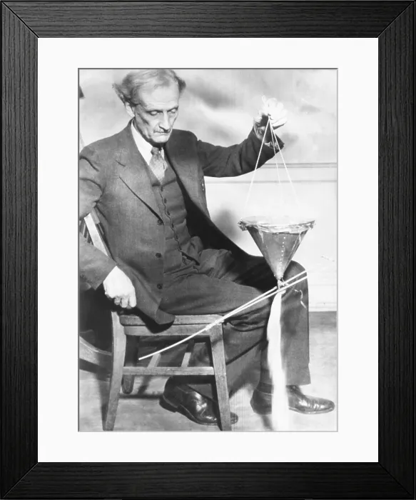 Framed Print : Dr. Jean Piccard, stratosphere balloonist demonstrated automatic ballast release. June 7, 1945 Framed Print : Dr. Jean Piccard, stratosphere balloonist demonstrated automatic ballast release. June 7, 1945