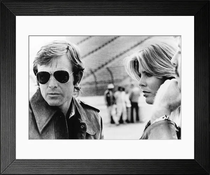 Framed Print : American racing driver Peter Revson with model Marjorie Wallace at the Ontario Speedway. March 9, 1974 Framed Print : American racing driver Peter Revson with model Marjorie Wallace at the Ontario Speedway. March 9, 1974
