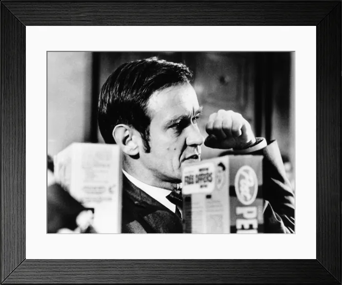 Framed Print : Robert Choate, behind boxes of mass market breakfast cereals, testifying in Congress. Sept. 9, 1972. Choate attacked the nutritional value of many breakfast cereals