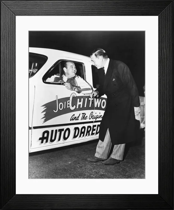 Framed Print : Clark Gable, star of the MGM movie TO PLEASE A LADY, gives Joie Chitwood a wish of good luck Framed Print : Clark Gable, star of the MGM movie TO PLEASE A LADY, gives Joie Chitwood a wish of good luck