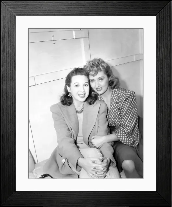Framed Print : I WANT A DIVORCE, from left: Gloria Blondell visiting her sister Joan Blondell on set, 1940