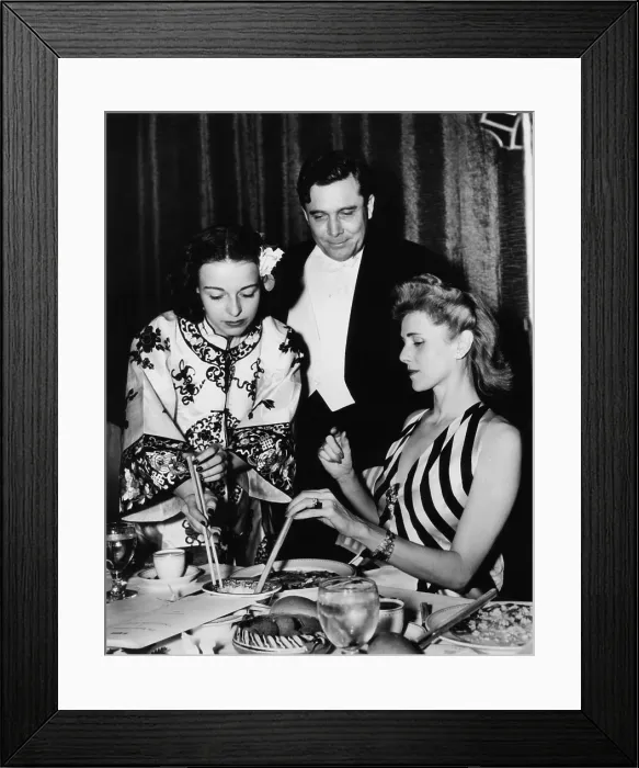 Framed Print : Clare Booth Luce and Wendell Willkie at the writers dinner for United China Relief. March 26, 1941. They take instruction on the use of chopsticks from a costumed debutante Framed Print : Clare Booth Luce and Wendell Willkie at the writers dinner for United China Relief. March 26, 1941. They take instruction on the use of chopsticks from a costumed debutante