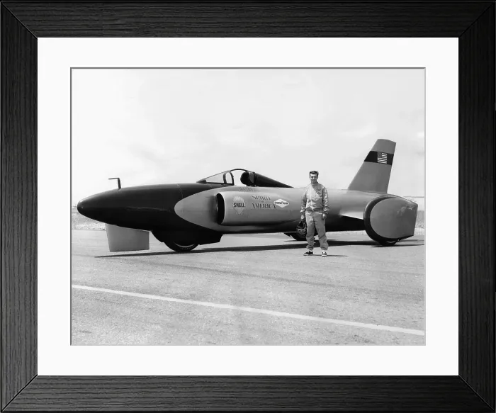 Framed Print : Craig Breedlove stands beside his jet car Spirit of America on the Bonneville Salt Flats in Utah. July 25, 1963 Framed Print : Craig Breedlove stands beside his jet car Spirit of America on the Bonneville Salt Flats in Utah. July 25, 1963