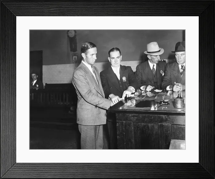Framed Print : Bruno Hauptmann fingerprinted after his arrest for the possession of Lindbergh ransom money. At Police Headquarters, New York City, Sept. 21, 1934 (CSU_2015_7_445)