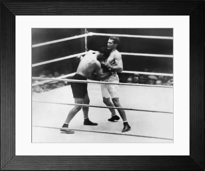 Framed Print : Gene Tunney-Jack Dempsey boxing match or the Long Count Fight of Sept. 22, 1927. Dempsey (dark trunks) boring in during the second round Framed Print : Gene Tunney-Jack Dempsey boxing match or the Long Count Fight of Sept. 22, 1927. Dempsey (dark trunks) boring in during the second round