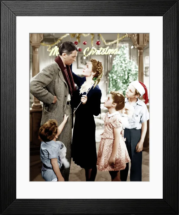 Framed Print : IT'S A WONDERFUL LIFE, from bottom left: Jimmy Hawkins, James Stewart, Donna Reed, Carol Coomes, Larry Simms, 1946 Framed Print : IT'S A WONDERFUL LIFE, from bottom left: Jimmy Hawkins, James Stewart, Donna Reed, Carol Coomes, Larry Simms, 1946