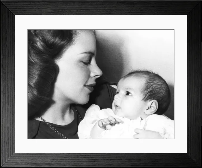 Framed Print : Liza Minnelli cuddled in the arms of her mother, famed singer Judy Garland in 1946. (CSU_2015_11_1615) Framed Print : Liza Minnelli cuddled in the arms of her mother, famed singer Judy Garland in 1946. (CSU_2015_11_1615)