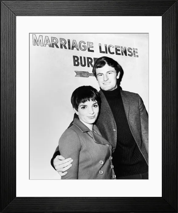 Framed Print : Liza Minnelli and Australian singer Peter Allen at the Marriage License Bureau. New York City, Feb. 20, 1967