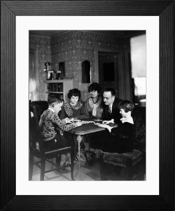 Framed Print : Dr. Karl A. Menninger, psychiatrist, playing a game with his family. Ca. 1930. L-R: Robert Gaines, Julia, Mrs. Menninger, Dr. Menninger, and Martha. (CSU_2015_11_1626)